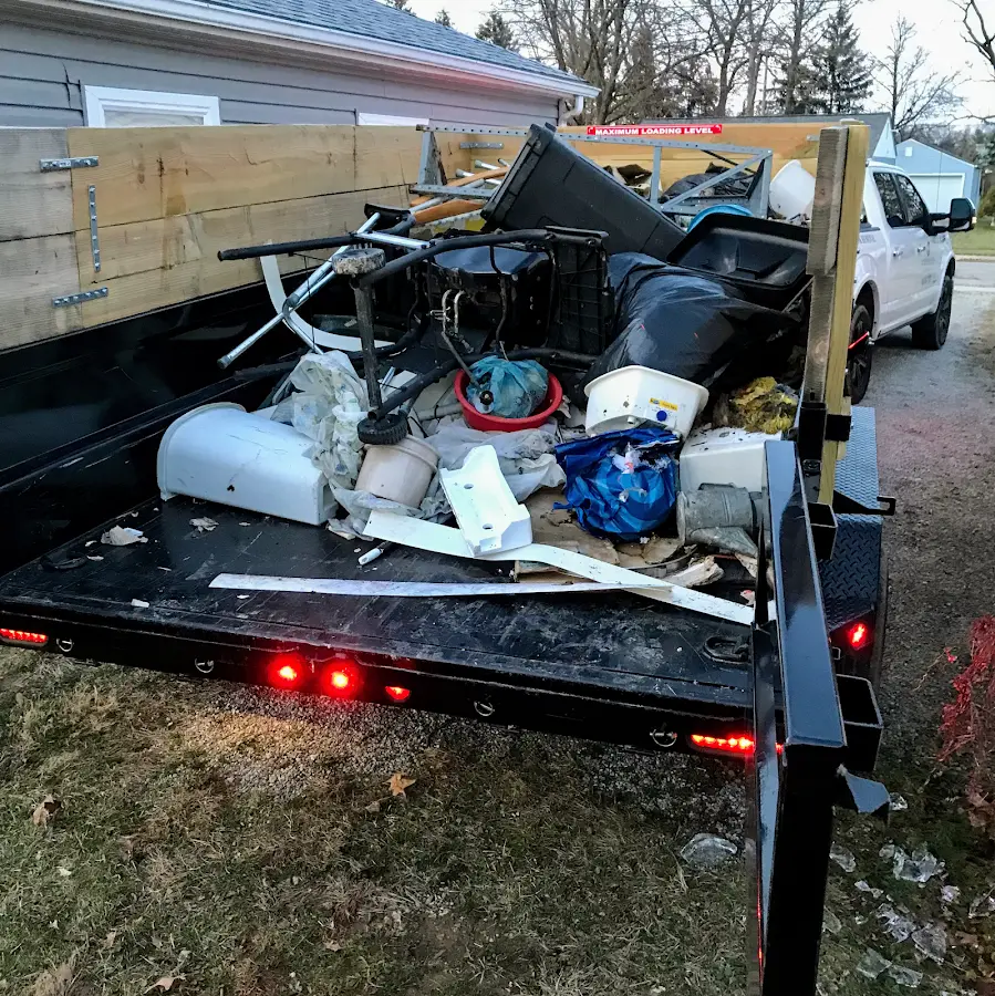 Roll-off dumpster delivered to a residential driveway in Paulden